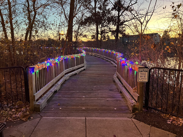 Color along the boardwalk rails at sunset