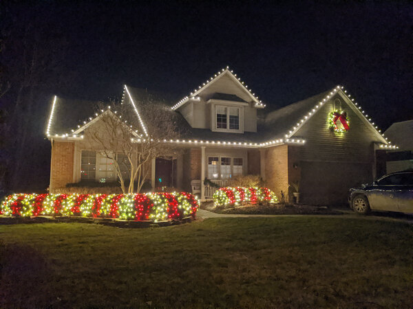 Warm eaves above candy-striped beds