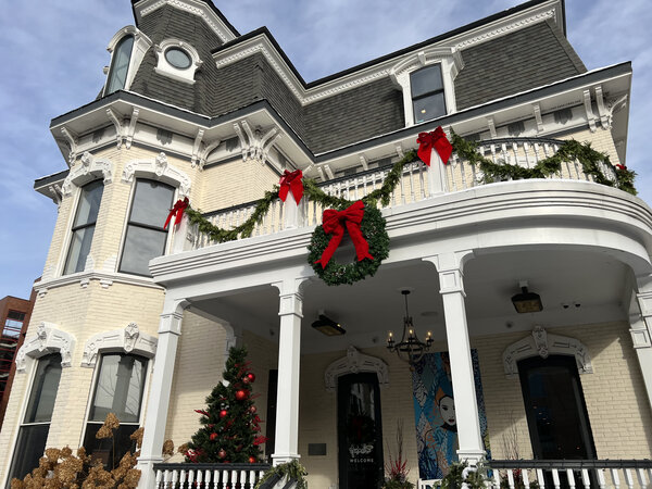 A Victorian draped in garland and bows